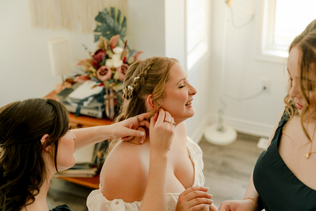Bride Emily getting ready at her Milton home before the wedding ceremony.