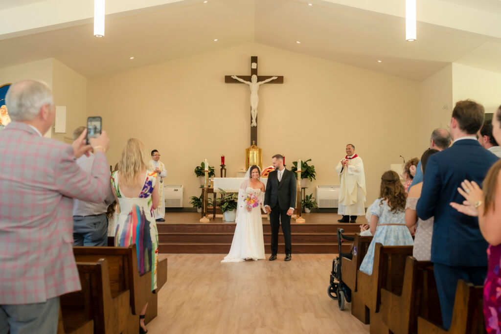 Emotional moments during Courtney and John’s church ceremony in Aurora, Ontario.