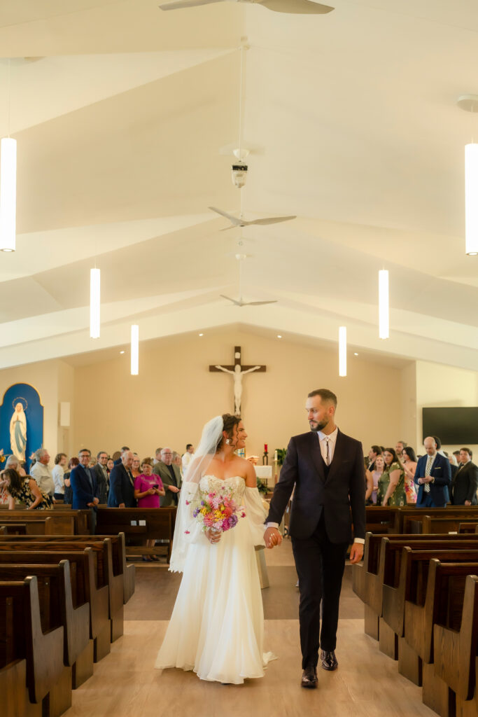 Emotional moments during Courtney and John’s church ceremony in Aurora, Ontario.